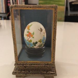 Hand painted egg in display case
